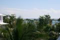 Blick vom Balkon mit seitlichem Meerblick, im Hintergrund das RIU Palace Tropical Bay.