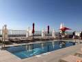 RIU Plaza Espana - Pool im 21. Stock.